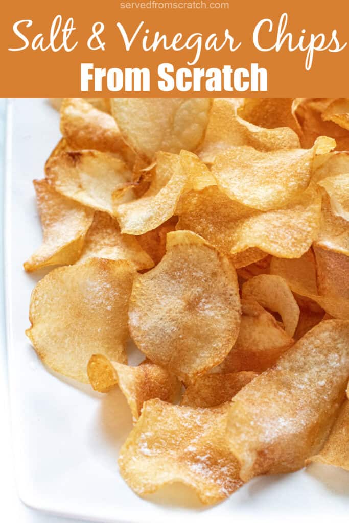 a close up of a plate of crispy homemade potato chips with Pinterest pin text.