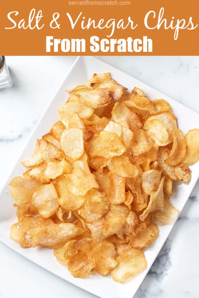 a close up of a plate of crispy homemade potato chips with Pinterest pin text.