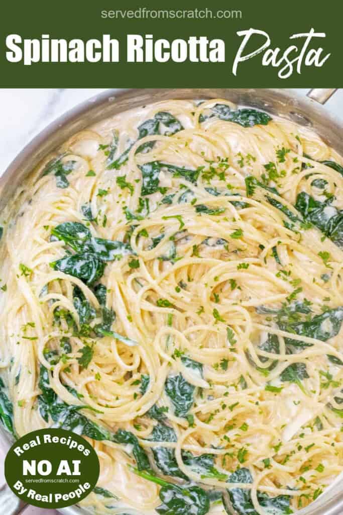 a pan with spaghetti with cream sauce and spinach with Pinterest pin text and NO AI sticker.