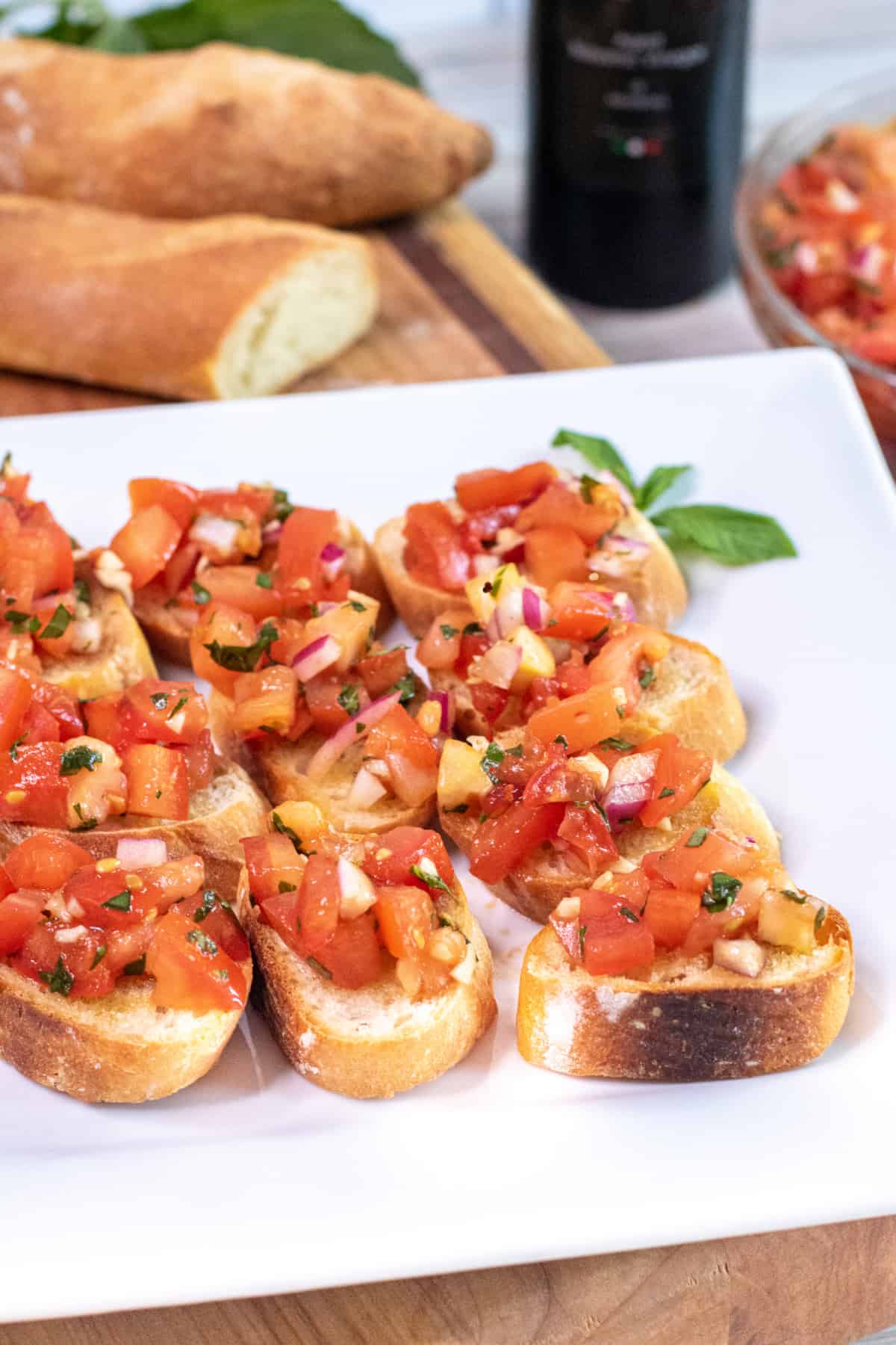 a plate of tomato bruschetta.