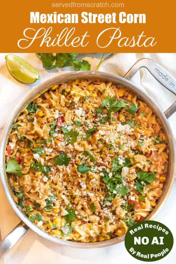 an overhead of a pan of pasta with cilantro, cheese, corn and a creamy sauce with Pinterest pin text with NO AI sticker.