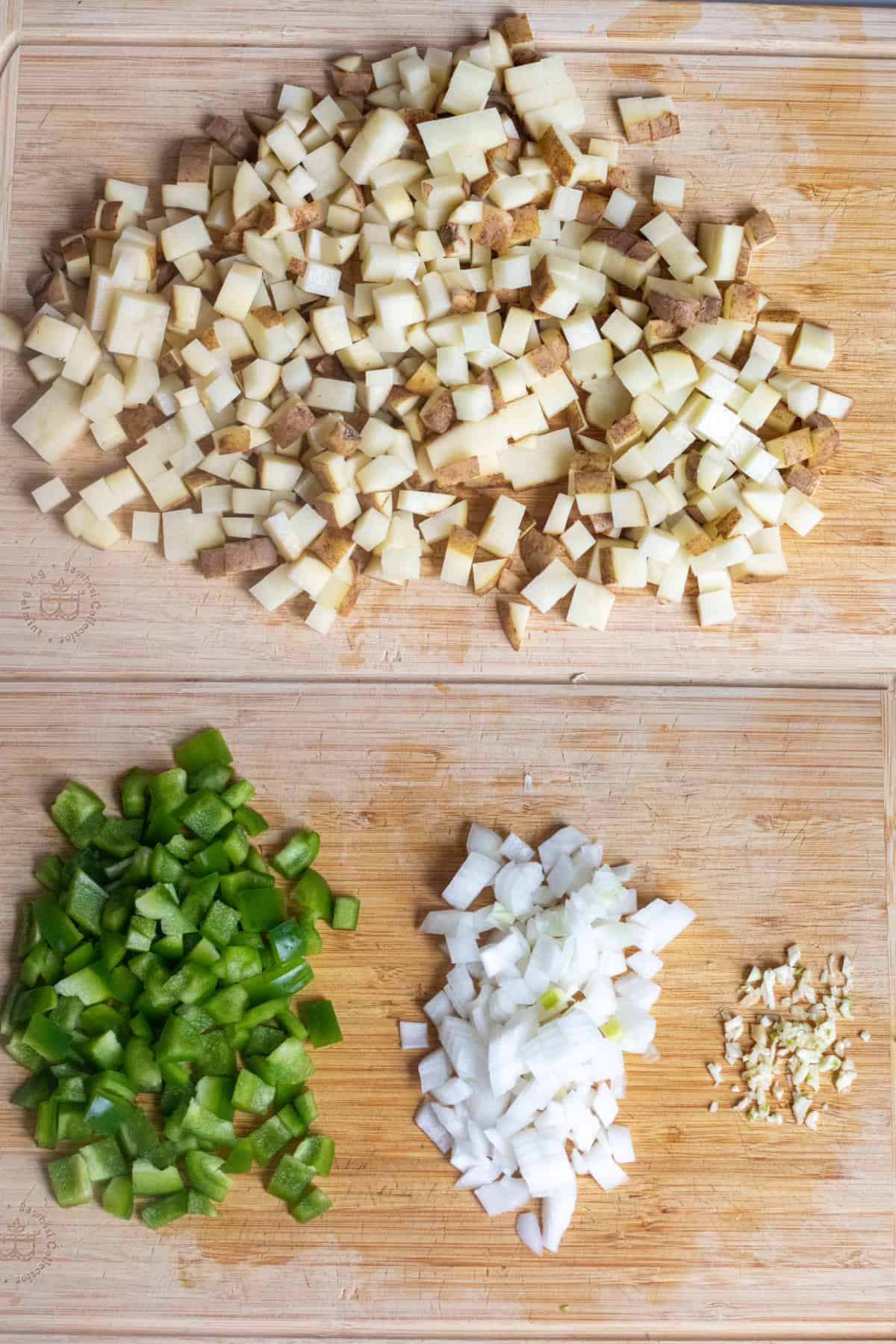 diced potatoes on a cutting board over another picture of a cutting board of bell pepper, onions, and garlic.