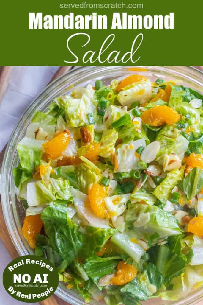 an overhead shot of a bowl of romaine lettuce salad with mandarins and almonds with Pinterest pin text and NO AI sticker.