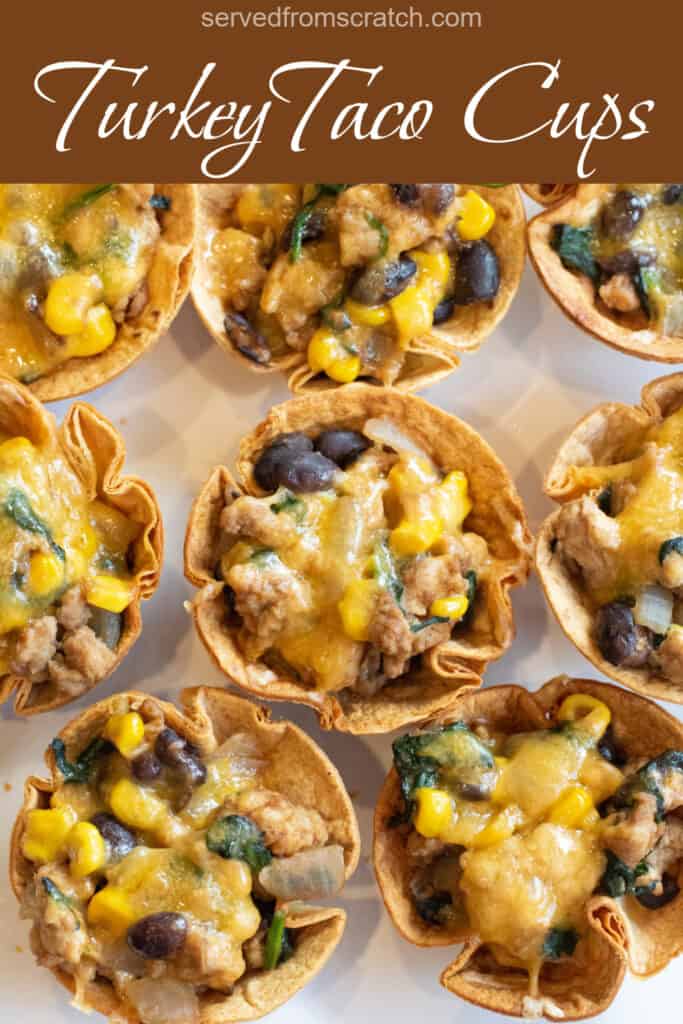 an overhead of taco cups with melted cheese on a plate with Pinterest pin text.