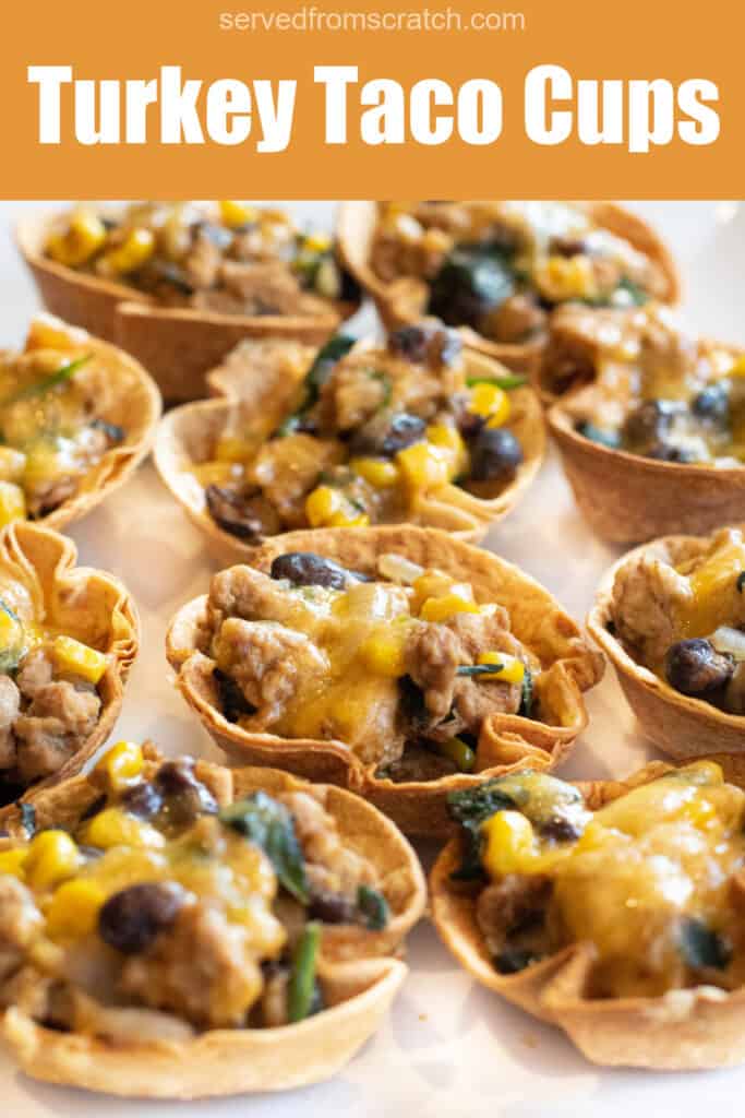 an overhead of taco cups with melted cheese on a plate with Pinterest pin text.