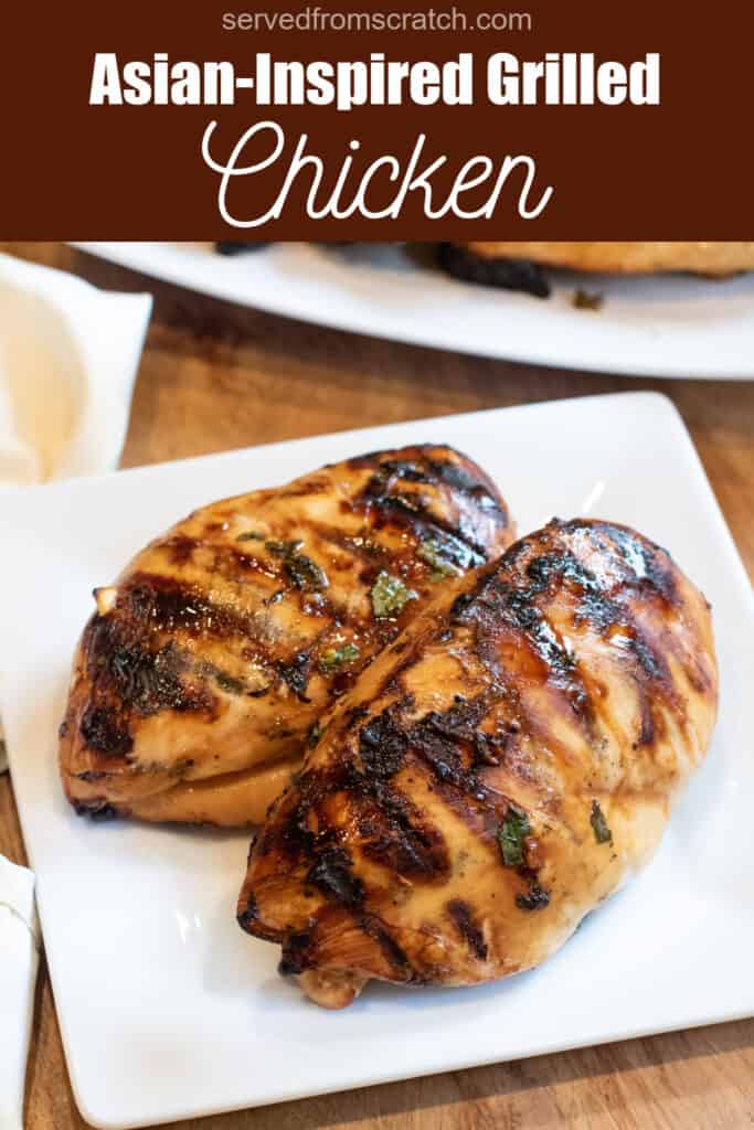two grilled chicken breasts on a plate with Pinterest pin text.