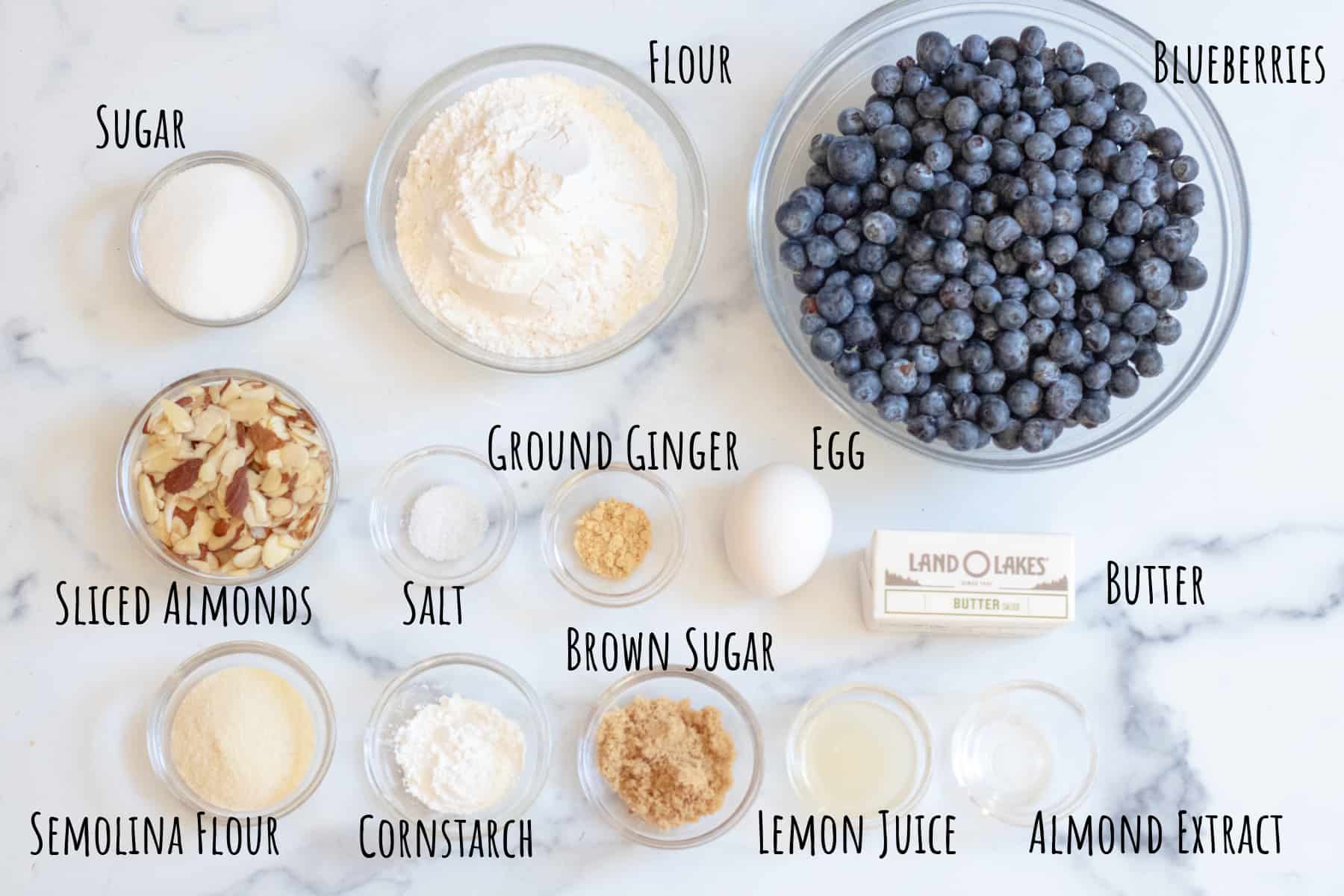 blueberries, flour, sugar, almonds, butter, egg, spices.