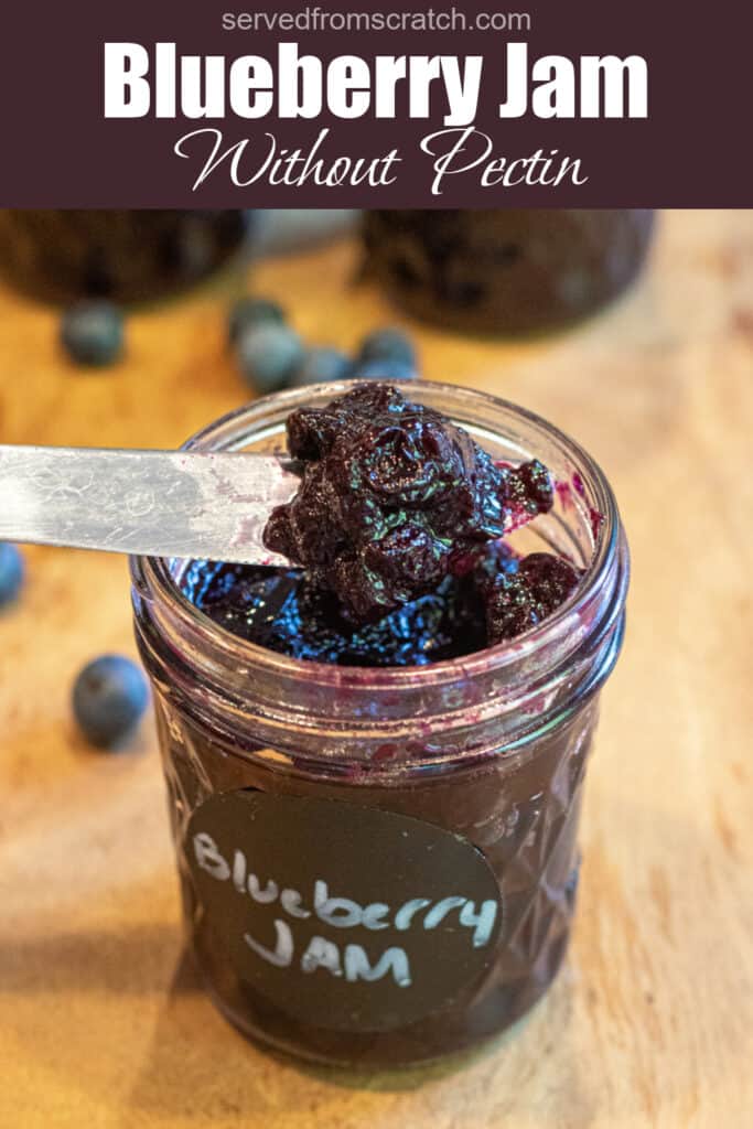 a mason jar labeled Blueberry jam and a knife taking some out with Pinterest pin text.