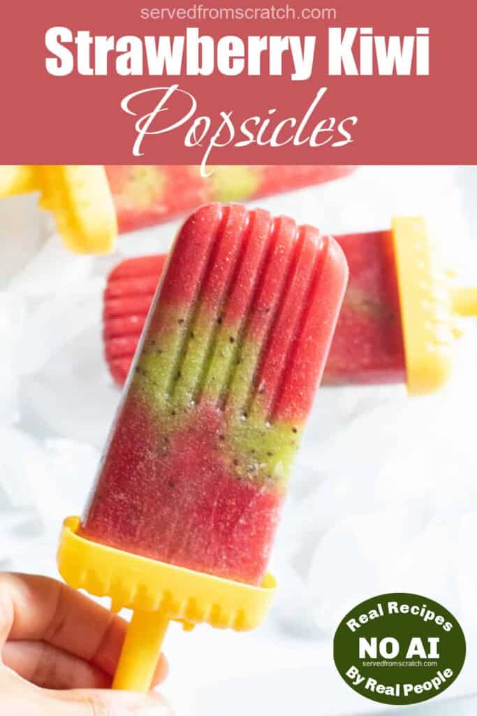 a strawberry and kiwi popsicle held by a hand with Pinterest pin text and NO AI sticker.