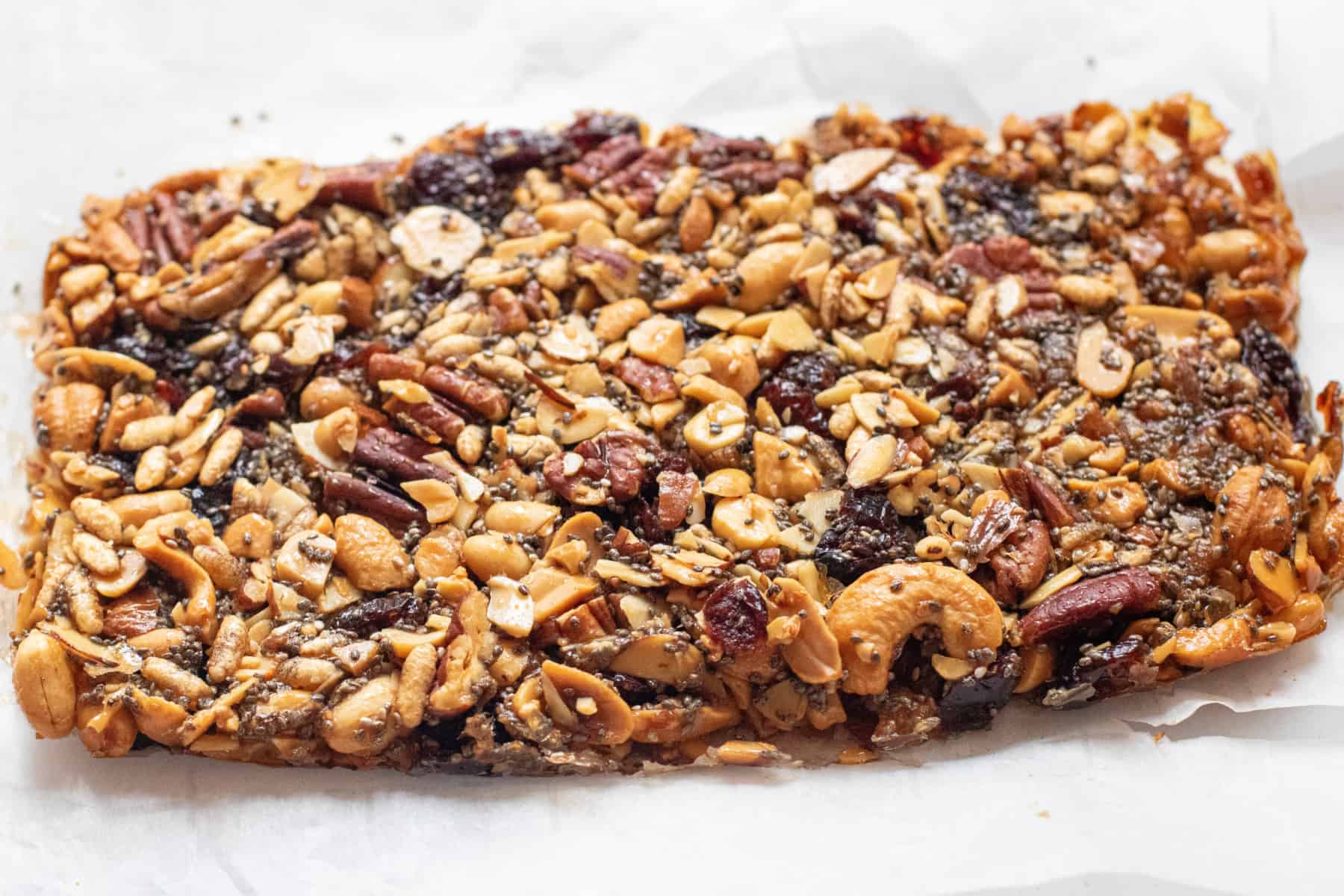 cooked bar of nuts and cranberries.
