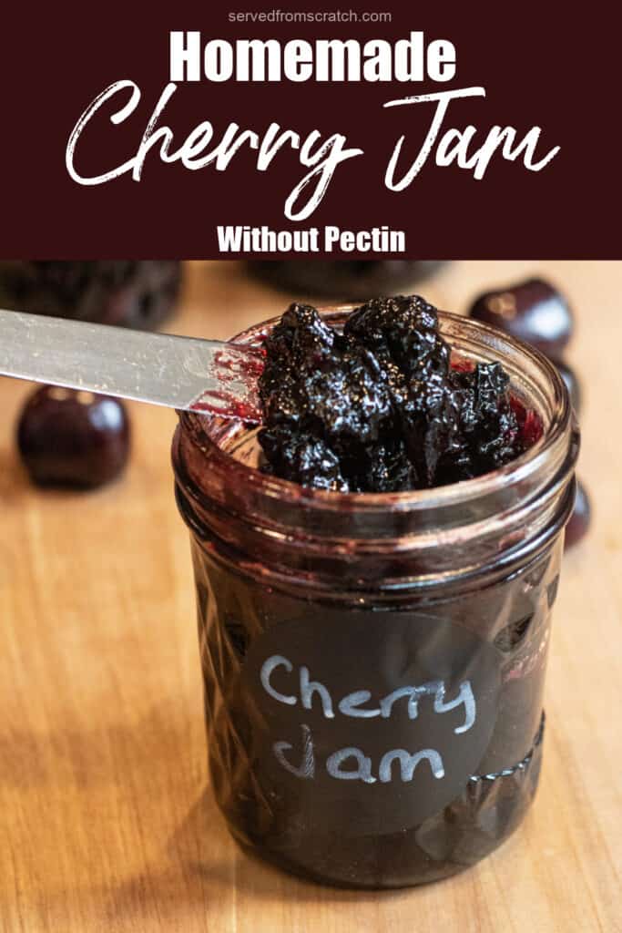 an open jar of labeled cherry jam with a knife taking some out with Pinterest pin text.