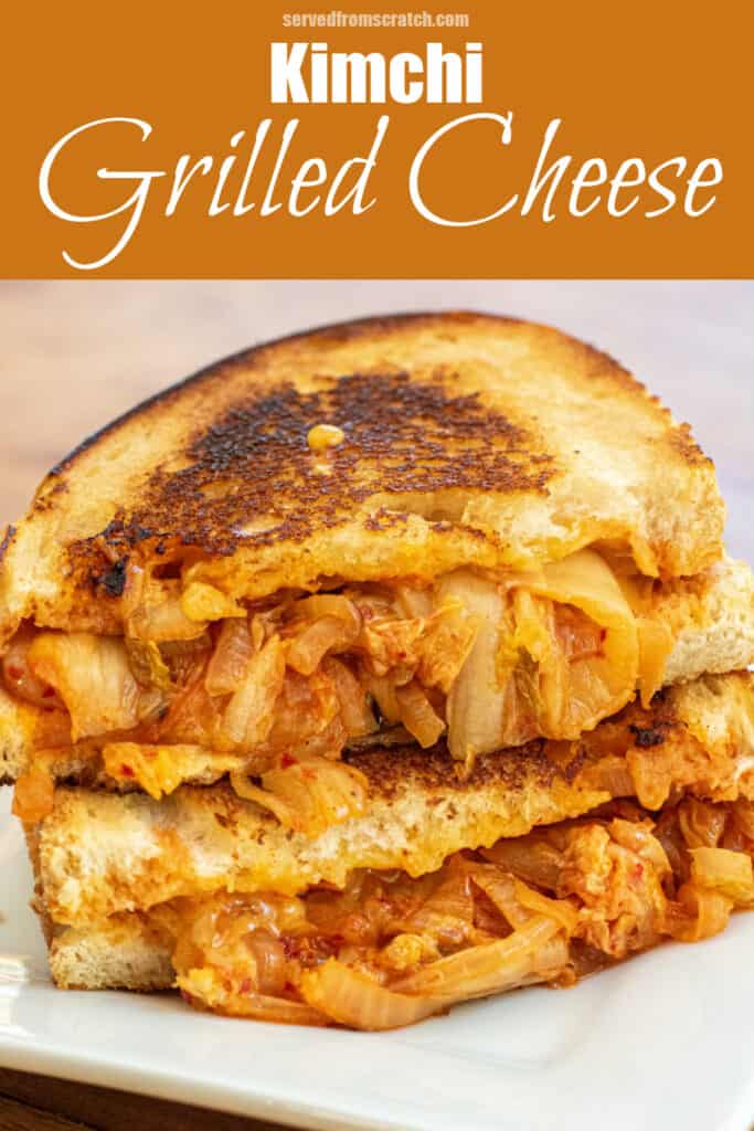 a stacked grilled cheese with onions and kimchi on a plate with Pinterest pin text.