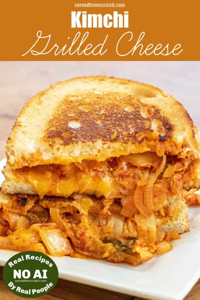 a stacked halved grilled cheese with kimchi and Pinterest pin text and NO AI sticker.