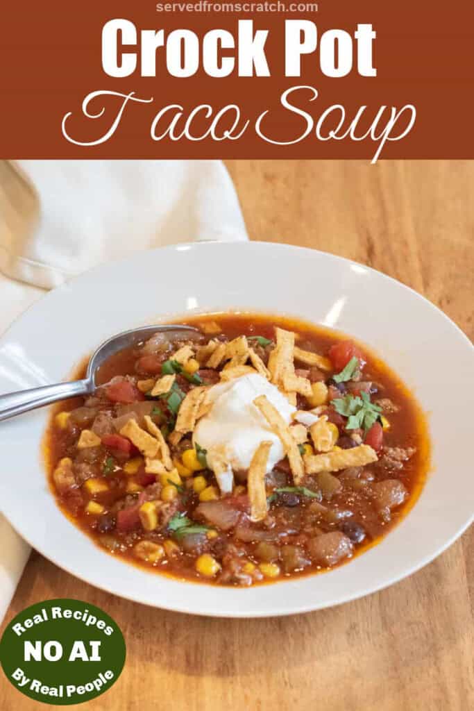 an overhead of bowl of taco soup with tortilla strips and sour cream and Pinterest pin text and NO AI sticker.