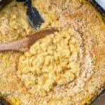 a cast iron with a scoop of mac n cheese.
