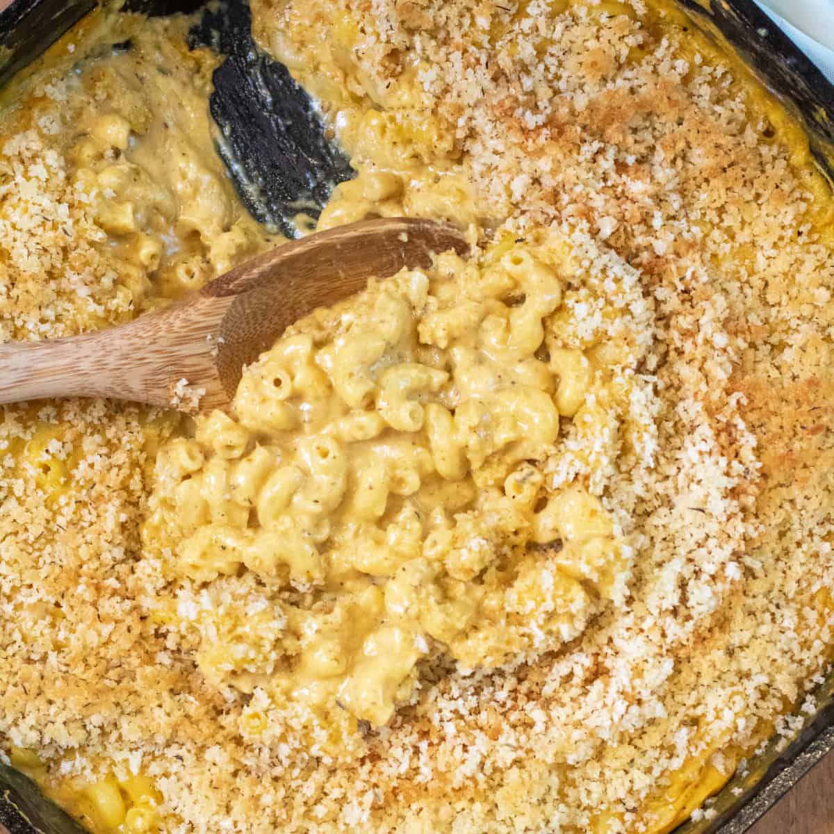 a cast iron with a scoop of mac n cheese.