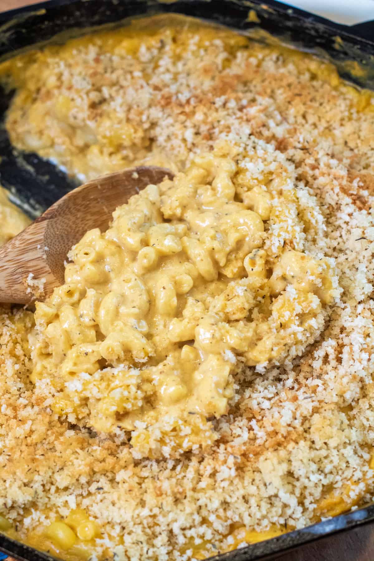 a cast iron with a scoop of mac n cheese.