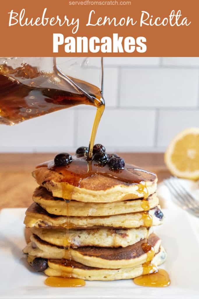 a stack of pancakes with blueberries and syrup being poured over it with Pinterest pin text.