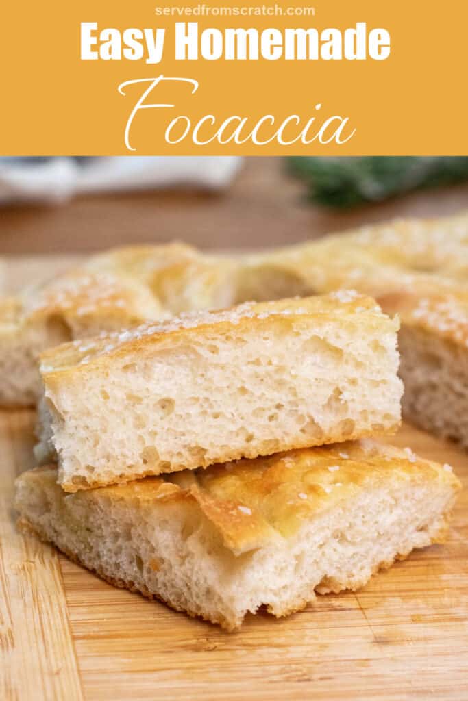 two pieces of stacked cut focaccia on a cutting board with the loaf with Pinterest pin text.