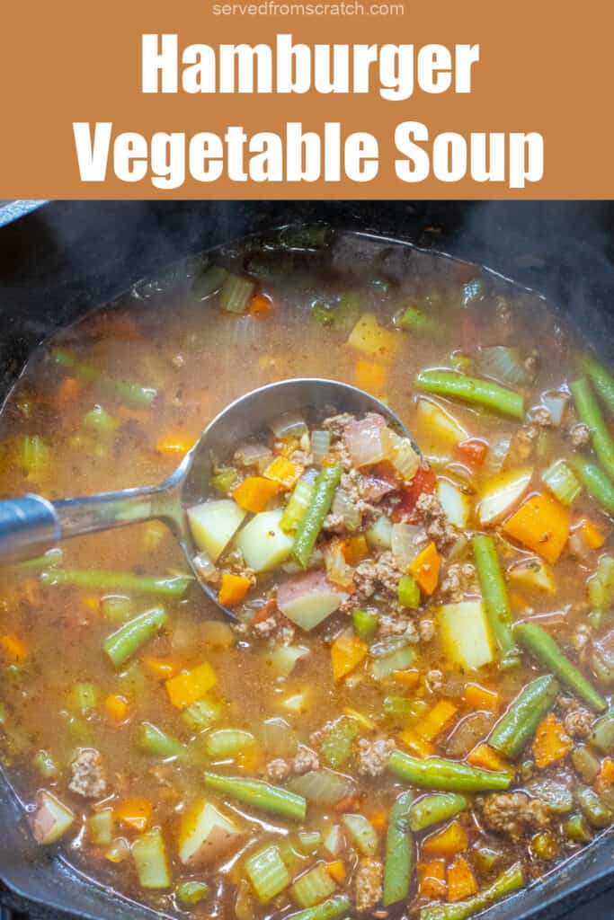 a dutch oven of beef and vegetable soup with a ladle in it with Pinterest pin text.