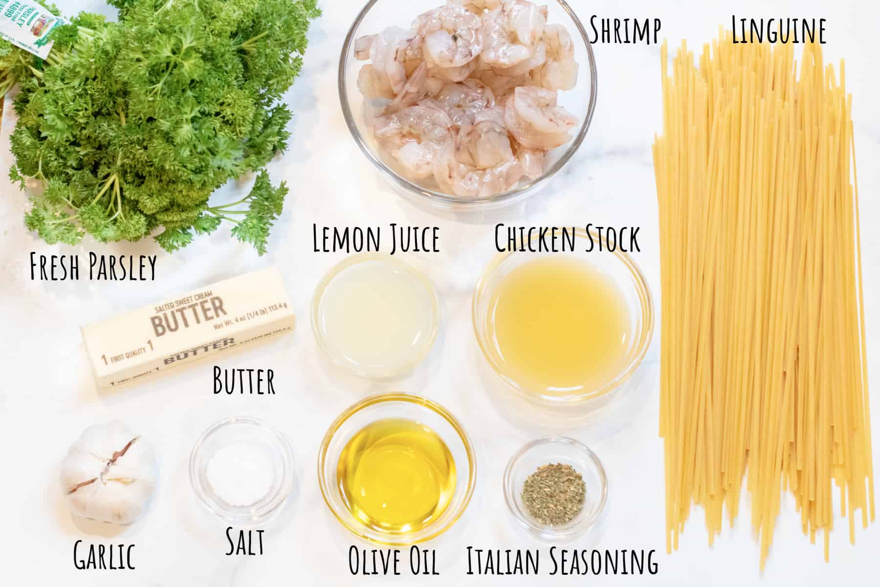 linguine, parsley, raw shrimp, garlic, butter, oil, stock, salt, lemon juice, and seasoning labeled.