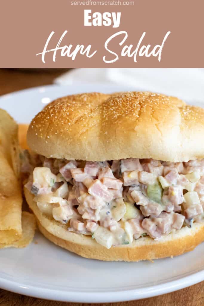 a bun with ham salad on a plate with Pinterest pin text.