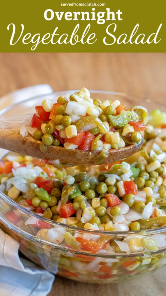 a wooden spoon holding up some vegetable salad with corn, peas, red pepper, and onion with Pinterest pin text.