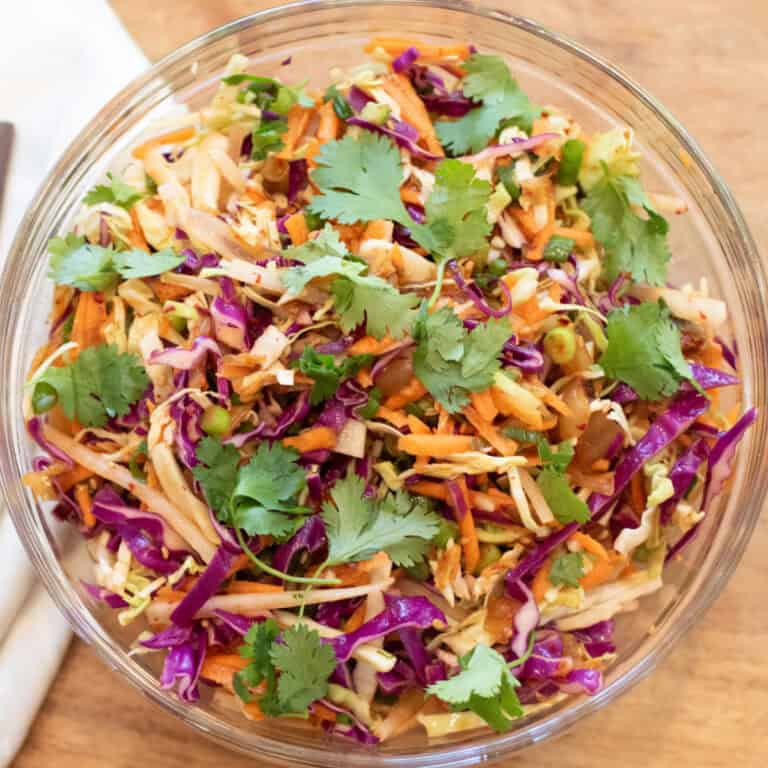 an overhead of a bowl of slaw with cilantro.