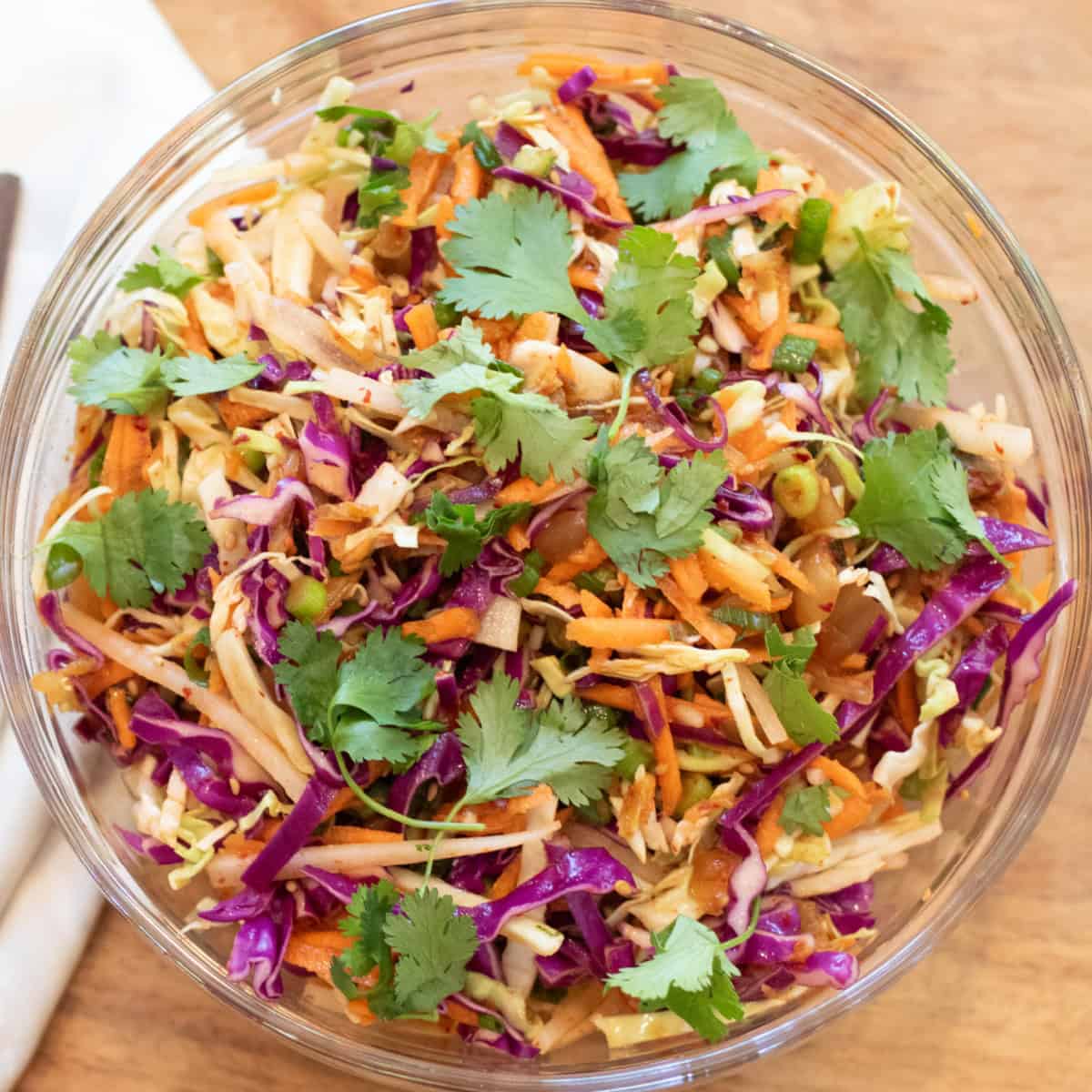 an overhead of a bowl of slaw with cilantro.