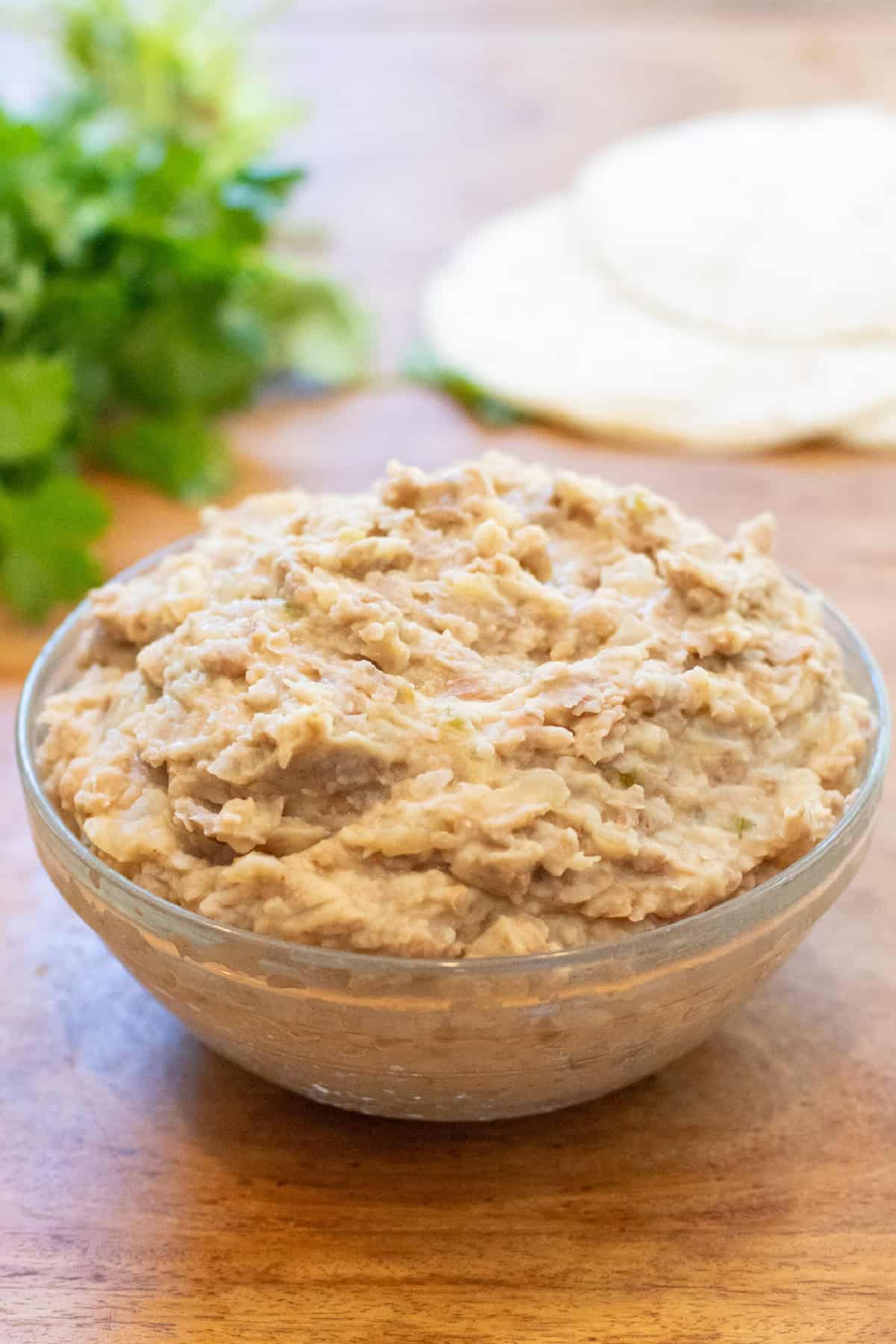 a bowl of refried beans.