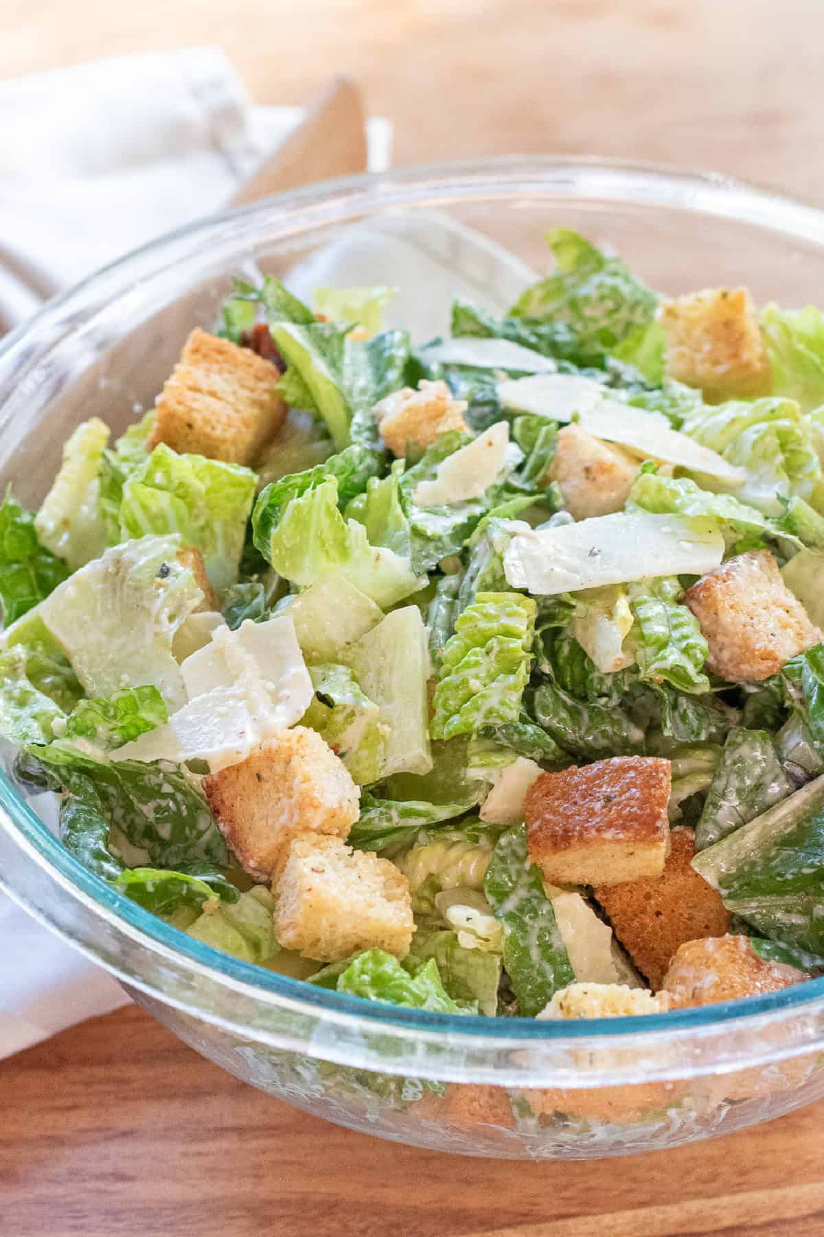 a bowl of caesar salad.