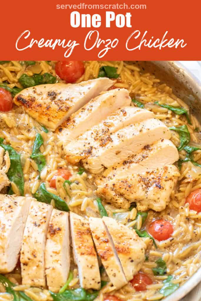 an overhead of a skillet with cooked sliced chicken and orzo and spinach and tomatoes with Pinterest pin text.