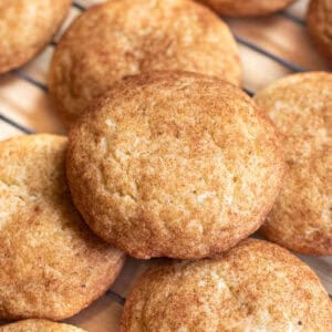 a cooling rack of thick coated Snickerdoodles.
