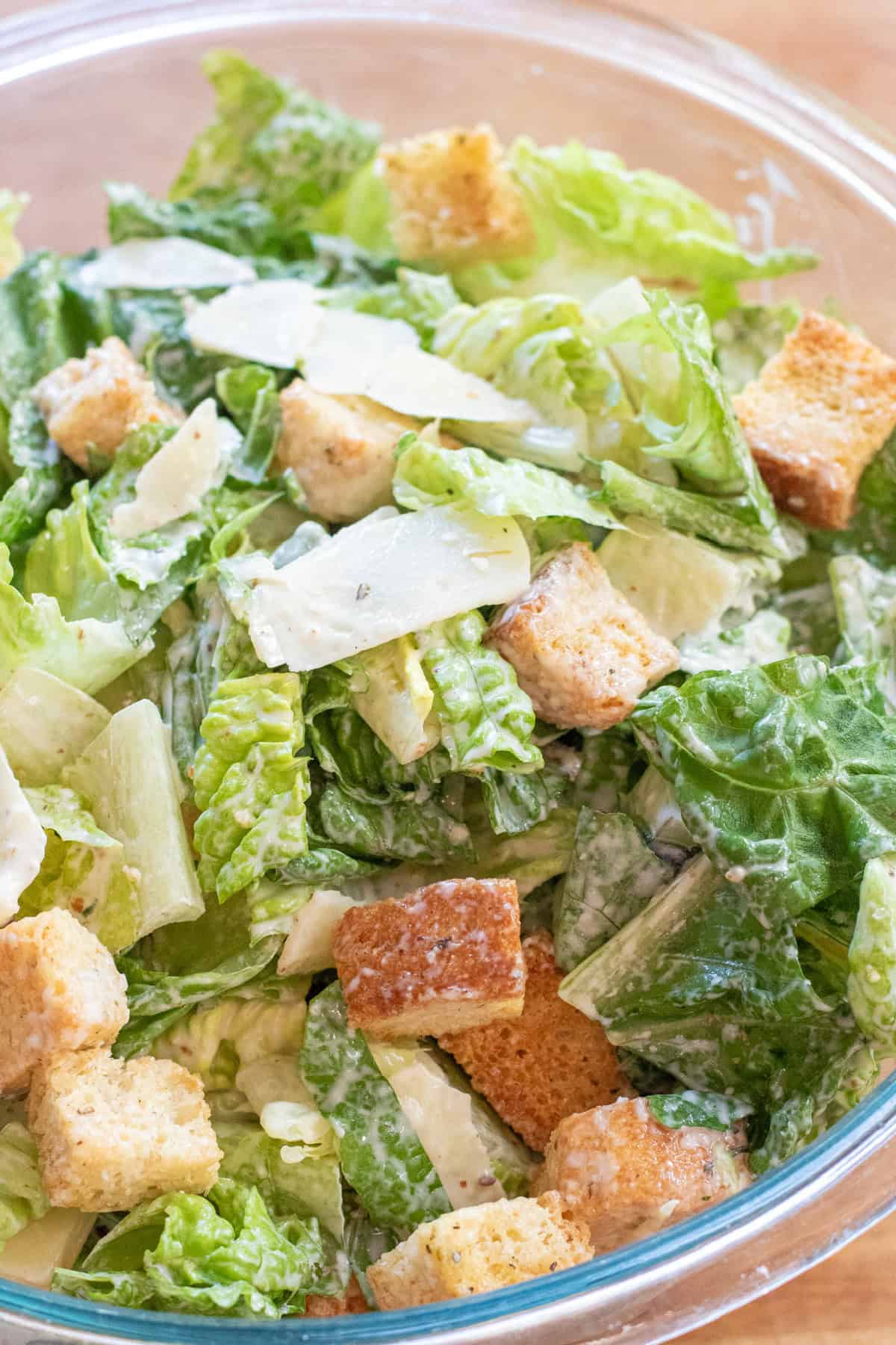 a bowl of caesar salad.