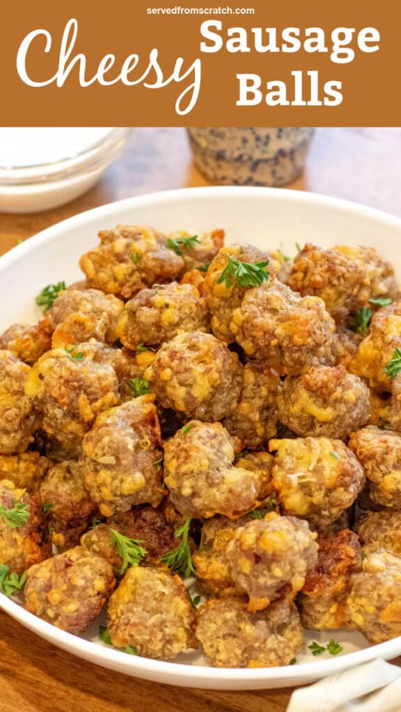 an overhead of a bowl of sausage balls with Pinterest pin text.