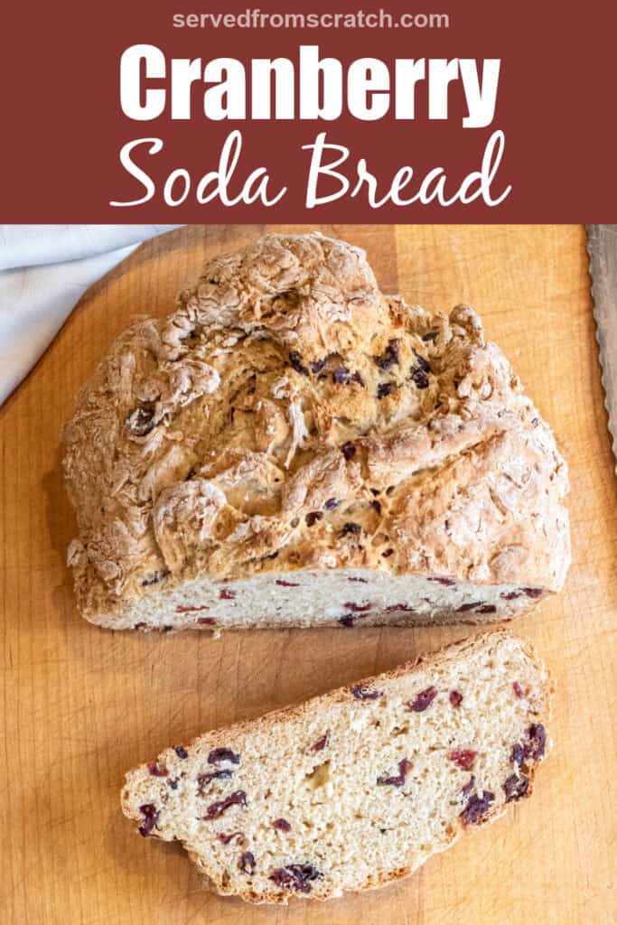 a loaf of bread with cranberries and a slice cut off with a bread knife with Pinterest pin text.