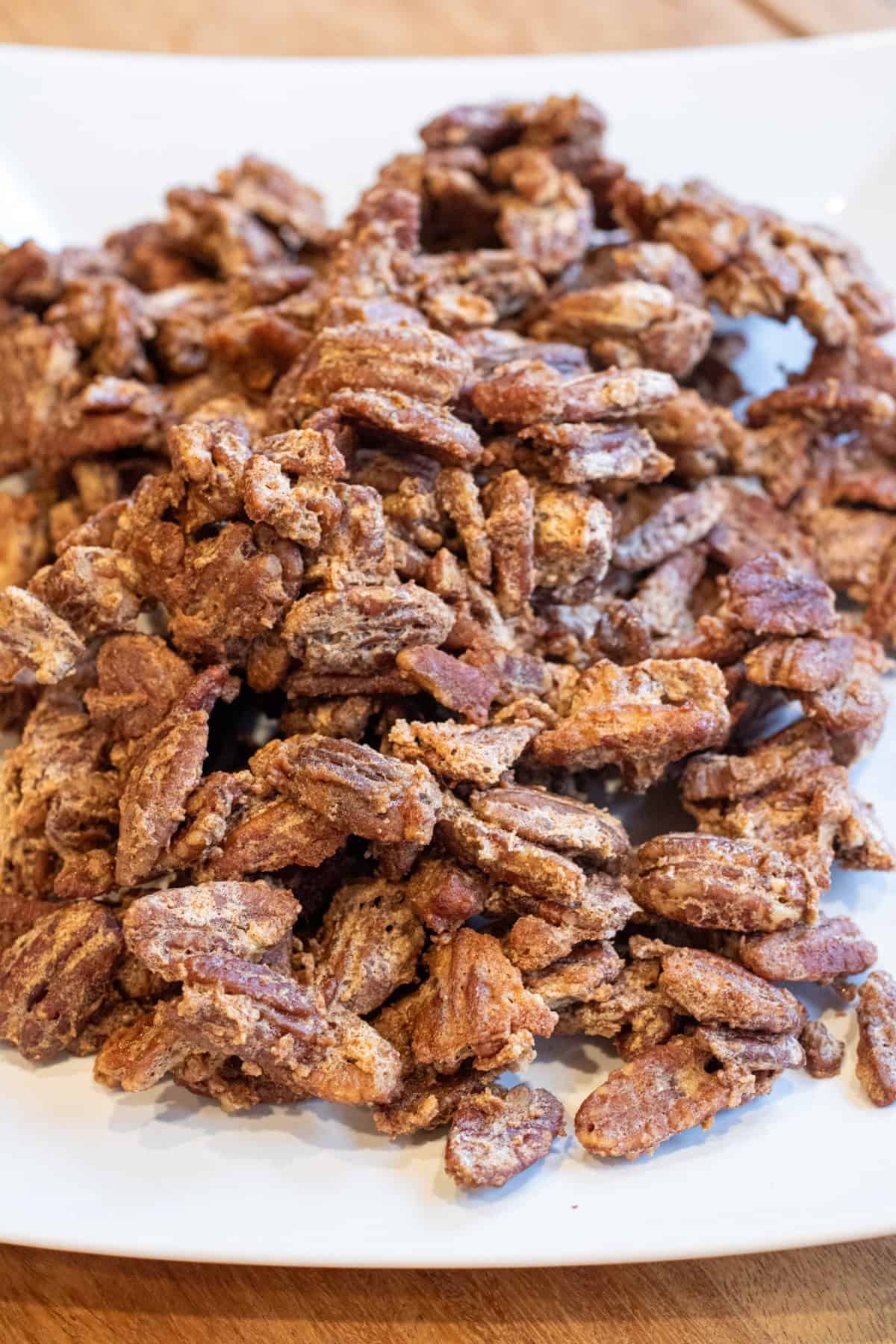 a plate of crispy crunchy pecans.