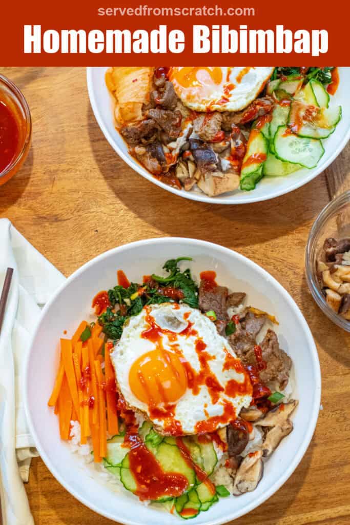 overhead of two big wide bowls of sliced carrots, cucumbers, spinach salad, beef, mushrooms, and an egg on top with sauce with Pinterest pin text.