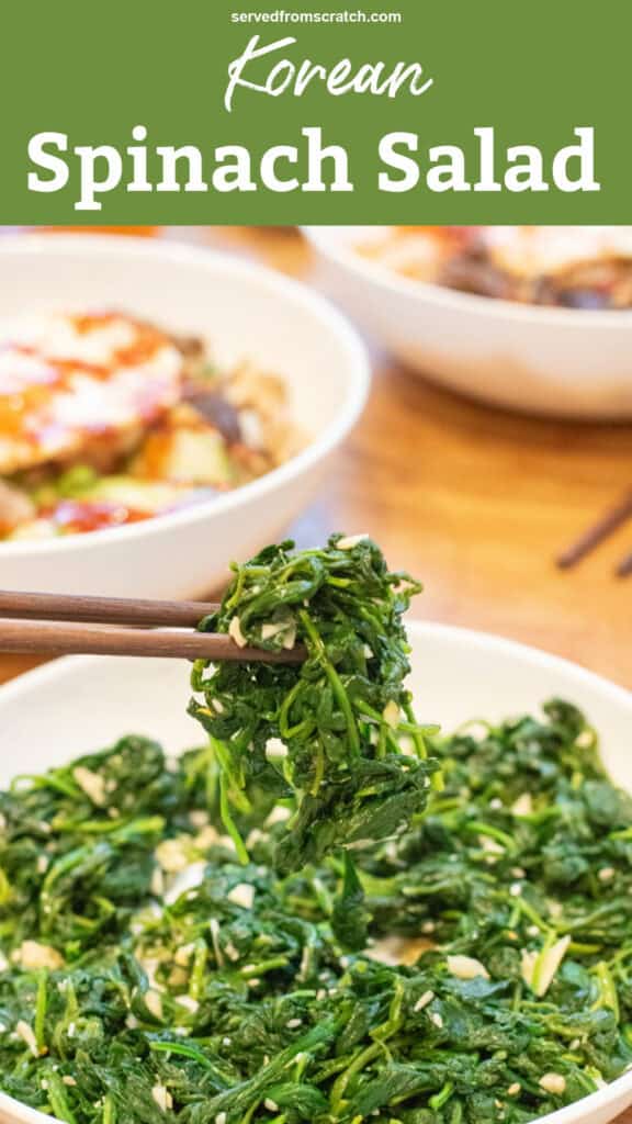 a bowl of blanched spinach with garlic and sesame seeds and some held up by chopsticks with Pinterest pin text.