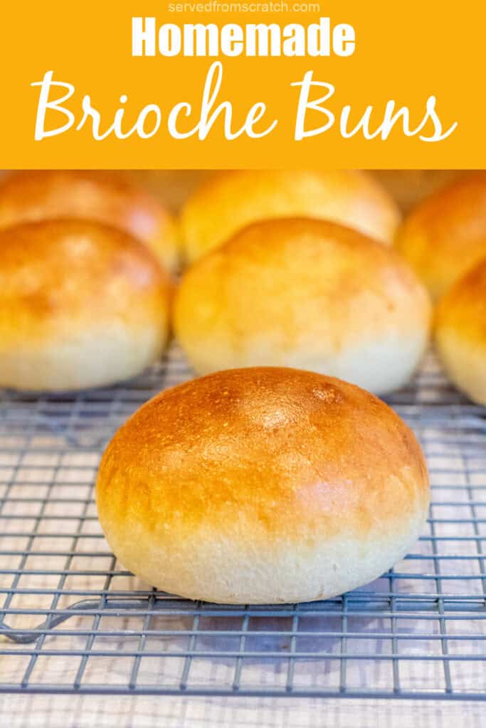 a baked brioche bun on a cooling rack with other buns with Pinterest pin text.