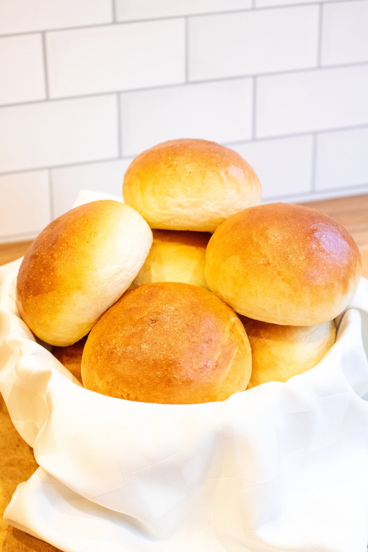 a basket of brioche buns.