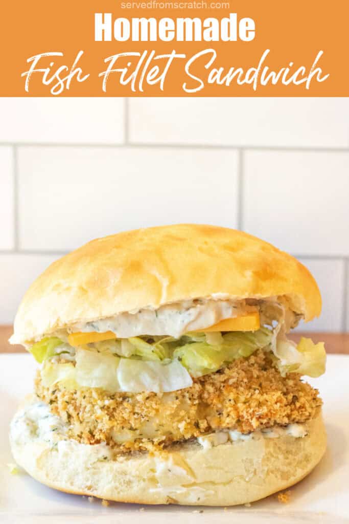 a breaded fish sandwich with lettuce and cheese on a brioche bun with Pinterest pin text.