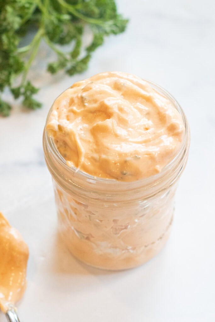 a jar of creamy dressing.