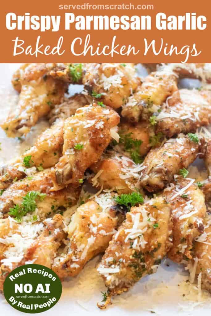 a plate of baked chicken wings with parsley and parmesan sprinkled on top with Pinterest pin text with NO AI sticker.