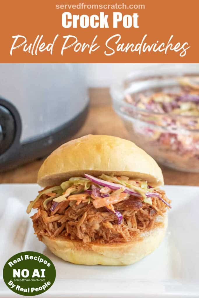 a close up of a pulled pork sandwich on a brioche bun on a plate with coleslaw with Pinterest pin text with NO AI sticker.