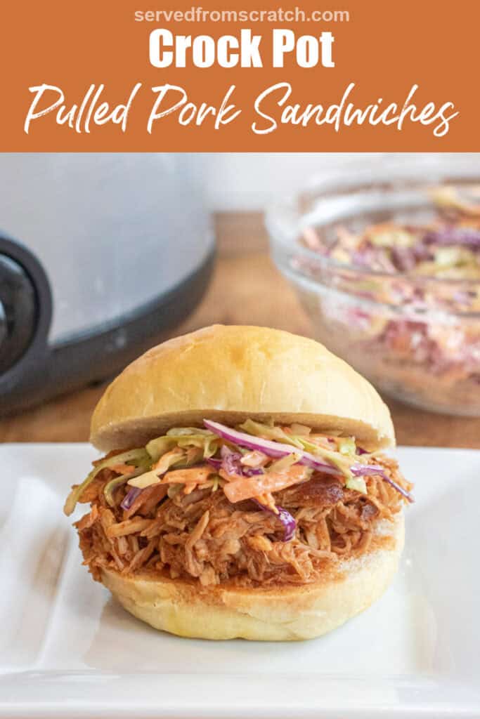 a close up of a pulled pork sandwich on a brioche bun on a plate with coleslaw with Pinterest pin text.