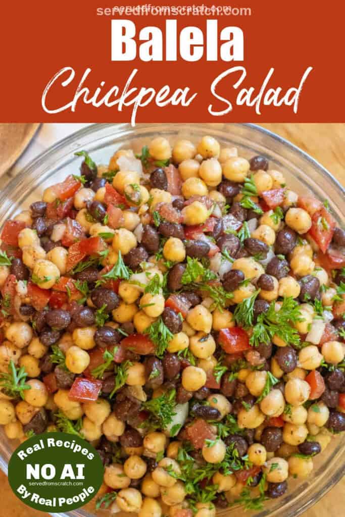 a salad with chickpeas black beans, tomatoes, and parsley with Pinterest pin text and NO AI sticker.