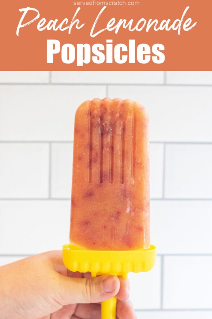 a hand holding a popsicle and Pinterest pin text.