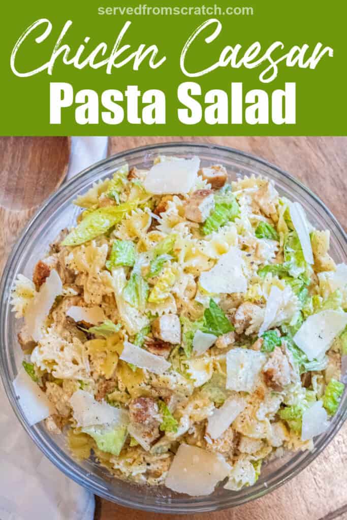 an overhead of a pasta salad with lettuce, chicken, croutons, and cheese and Pinterest pin text.