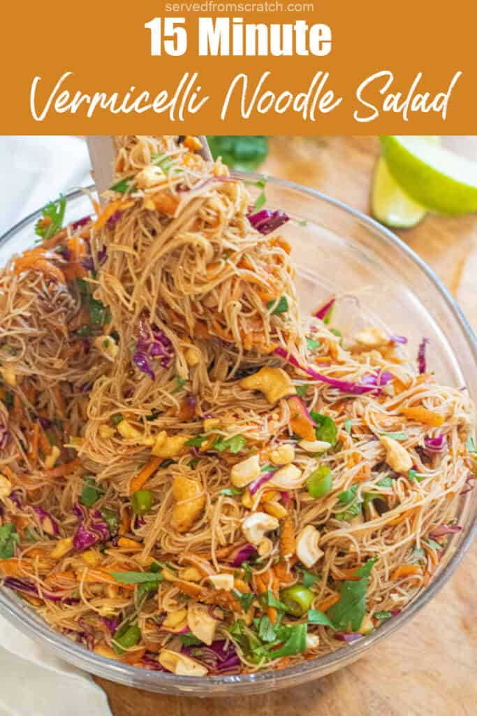 tongs holding up some noodles with cashews, cilantro, cabbage, and carrots with Pinterest pin text.